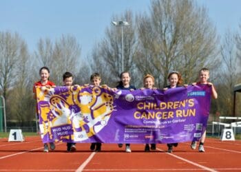 Mia Presch and Holly Brough (third and fourth from right with children from Inglewood Junior School
