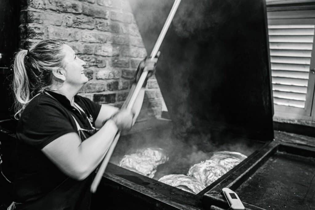 Robin Perris smoking the meat at Pappy's Texas Barbeque