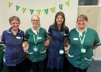 The West Cumbria MCCN team pictured together in a line and smiling