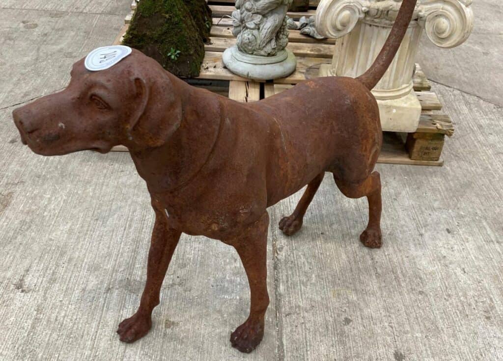 A life-size steel dog sold at auction. The dog is a chocolate labrador