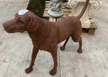 A life-size steel dog sold at auction