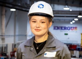 Megan Robertson can be seen in her grey Sellafield uniform and white safety helmet