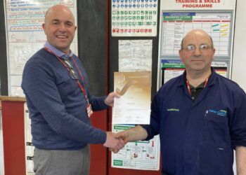 John Crook, who teaches engineering at Lakes College, being awarded a Bronze Pearson National Teaching Award for Further Education Lecturer of the Year by assistant principal Daniel Braithwaite.