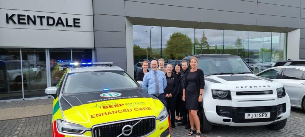 The team at Kentdale Landrover with the BEEP Emergency response vehicle and the landrover which is part of the roadshow