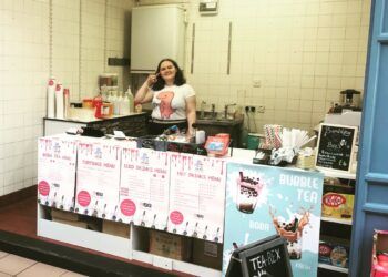 Anna Cole behind the counter at TEA-REX.