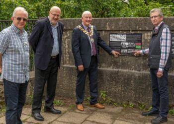 Graham Worsnop from the Cumbrian Railways Association, Steve Hughes, nephew of Tom Hughes, Andy Semple, Town Mayor and Phil Campbell, Chairman of Cockermouth Civic Trust.