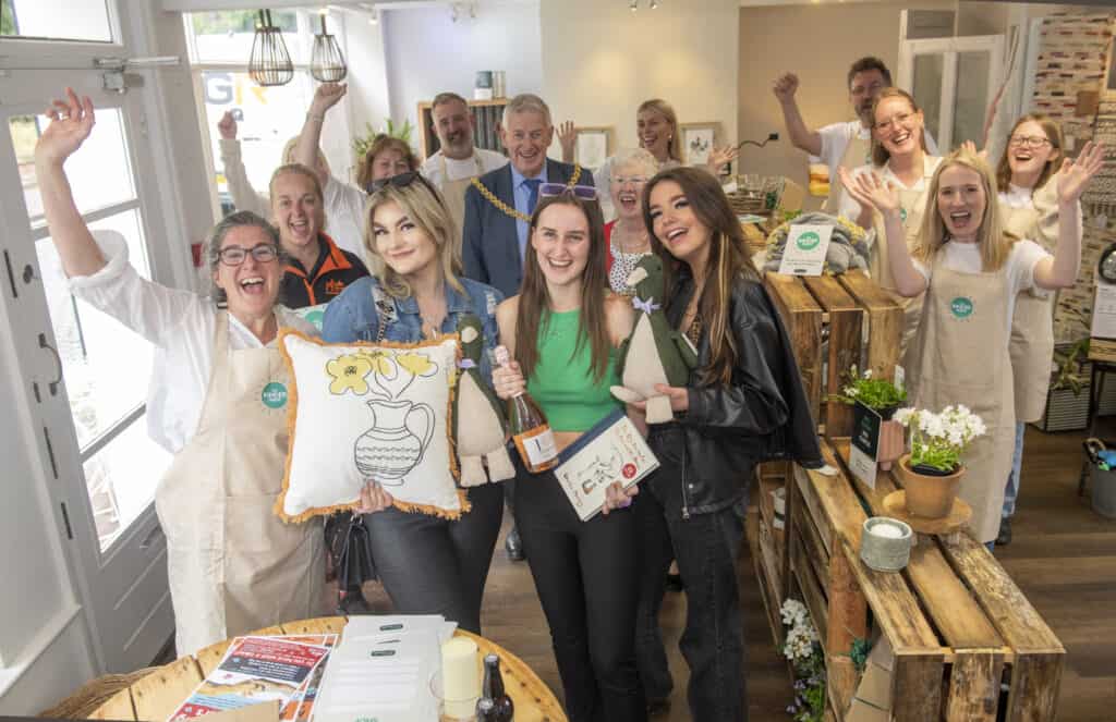 Intro PR and Social Media. The Kinder Shop brought to you by The Cumberland on Paternoster road in Carlisle. Pay by kindness donating time to local projects. Left to right. George Harland from Intro with Luce Johnstone, Keira Dequincey and Millie Butcher shopping. 22nd June 2022 Photograph Jonathan Becker