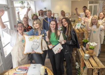 Intro PR and Social Media. The Kinder Shop brought to you by The Cumberland on Paternoster road in Carlisle. Pay by kindness donating time to local projects. Left to right. George Harland from Intro with Luce Johnstone, Keira Dequincey and Millie Butcher shopping. 22nd June 2022 Photograph Jonathan Becker