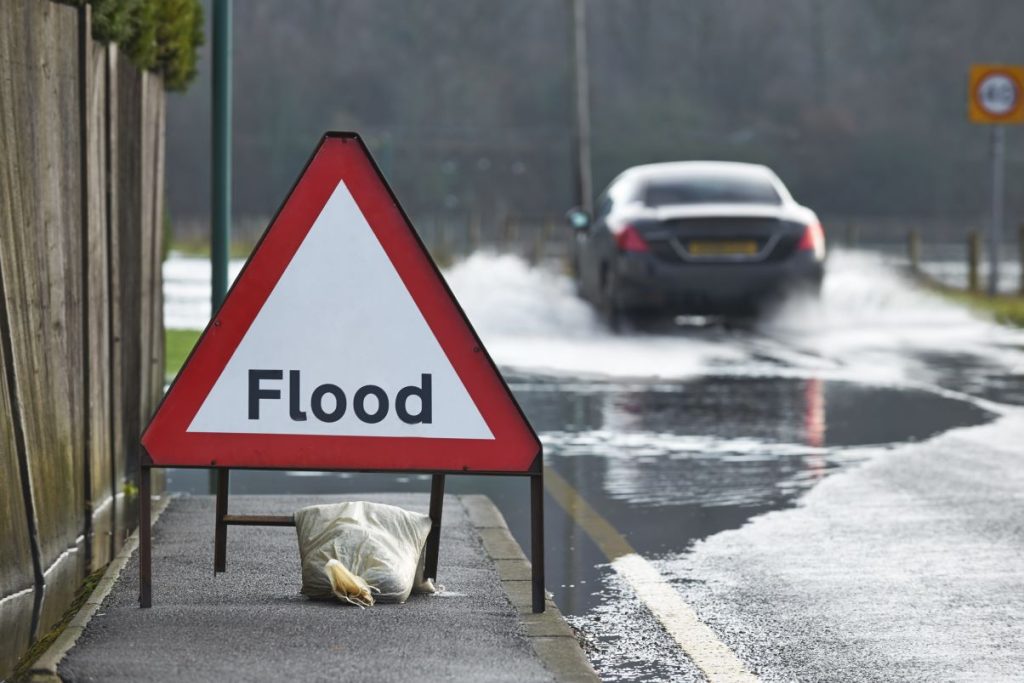 A595 closed in both directions due to floods and people warned to