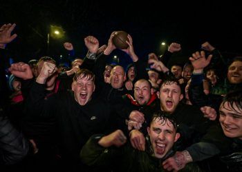 Weather warning and heavy rain doesn’t stop Workington’s historic Uppies and Downies