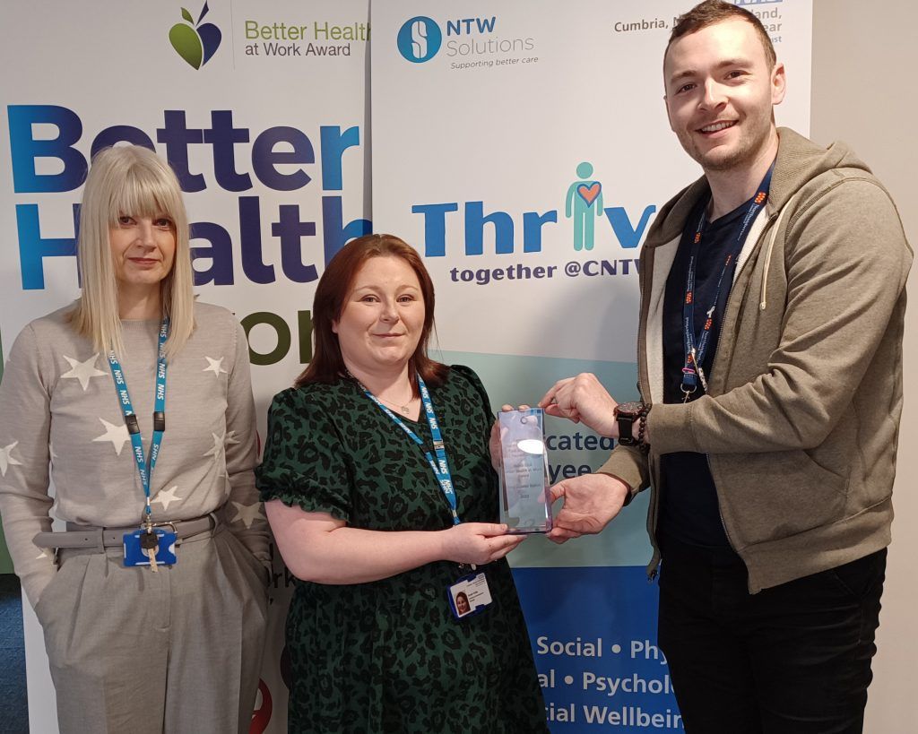 Sarah Kelly receives the award