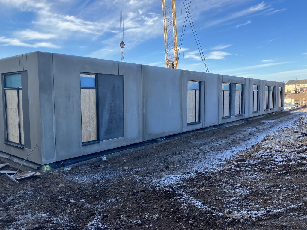 The first of the pre-cast concrete walls were delivered and erected on the site. 