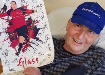Footy fan surprised with signed Carlisle United memorabilia in hospital