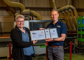 Sarah Woodhams from Made Smarter, presents Made Smarter 'gold' award to Paul Mallinson from Playdale Playgrounds