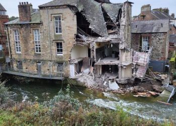 Building collapses into river in West Cumbria: Drivers urged to avoid area