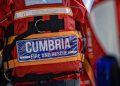 Cumbria Fire and Rescue service jacket, close up on the reflective and name label.